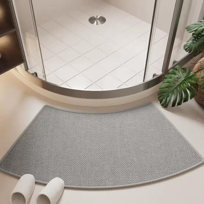 Tapis de bain incurvé en lin avec support en caoutchouc