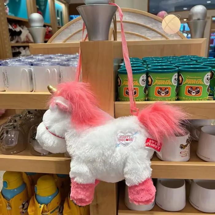 Poupée en peluche licorne originale Universal Studios, un sac à dos coussin/oreiller doux, idéal comme cadeau d'anniversaire et souvenir pour les filles