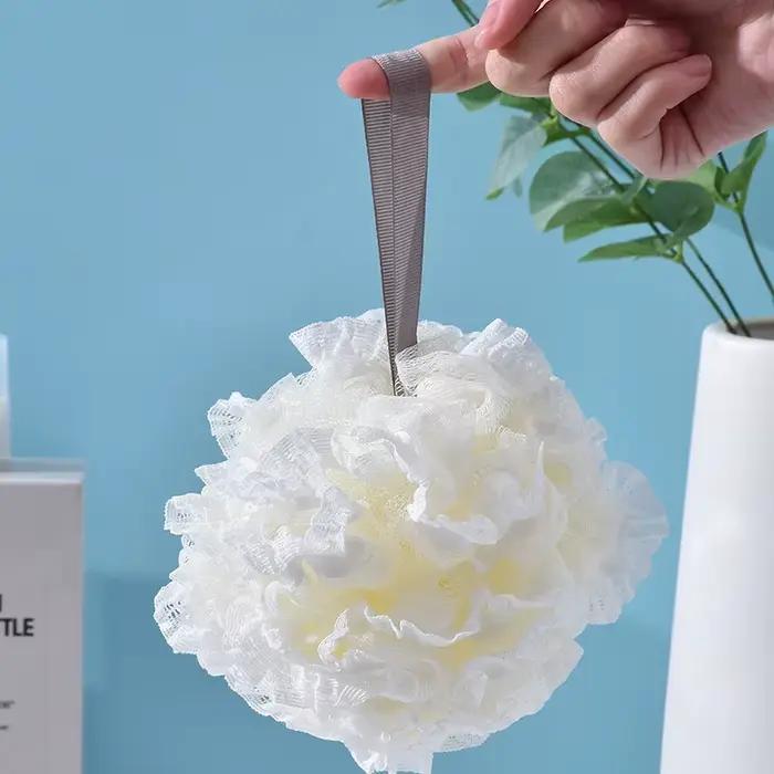 Serviette de bain en forme de boule de fleur pour homme