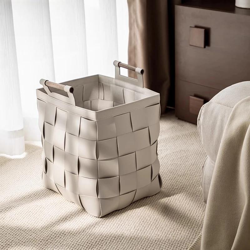 Panier à linge tissé en cuir