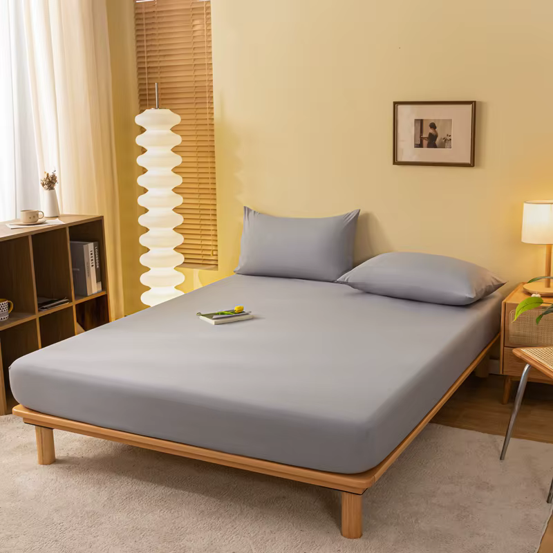 Drap-housse de couleur unie
