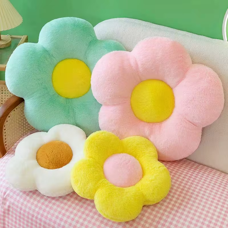 Coussin en tissu de forme circulaire à fleurs