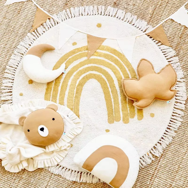 Tapis rond Lea avec pompon pour chambre d'enfant